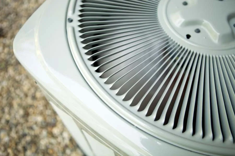 Top of an outdoor air conditioning condenser with fan grille